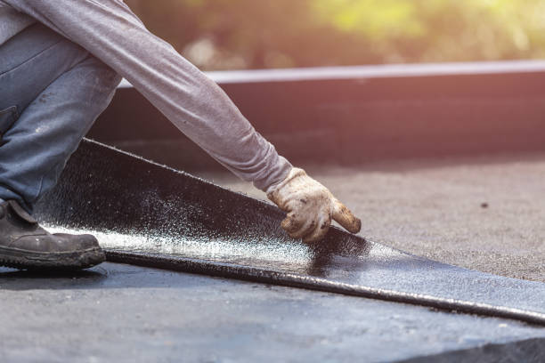 Professional Waterproofing technician working in Avon, NY